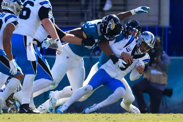 Carolina Panthers quarterback Bryce Young (9) is sacked by Jacksonville Jaguars linebackers Travon Walker (44) linebacker Josh Allen (41). © Corey Perrine/Florida Times-Union / USA TODAY NETWORK